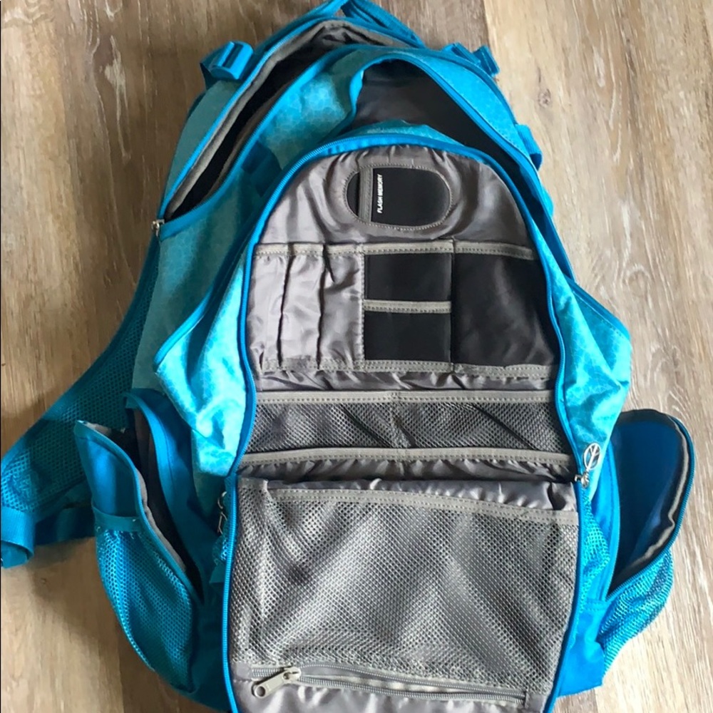 Backpack with multiple utility pockets. - Picture 2 of 3